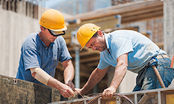 Construction workers, working together